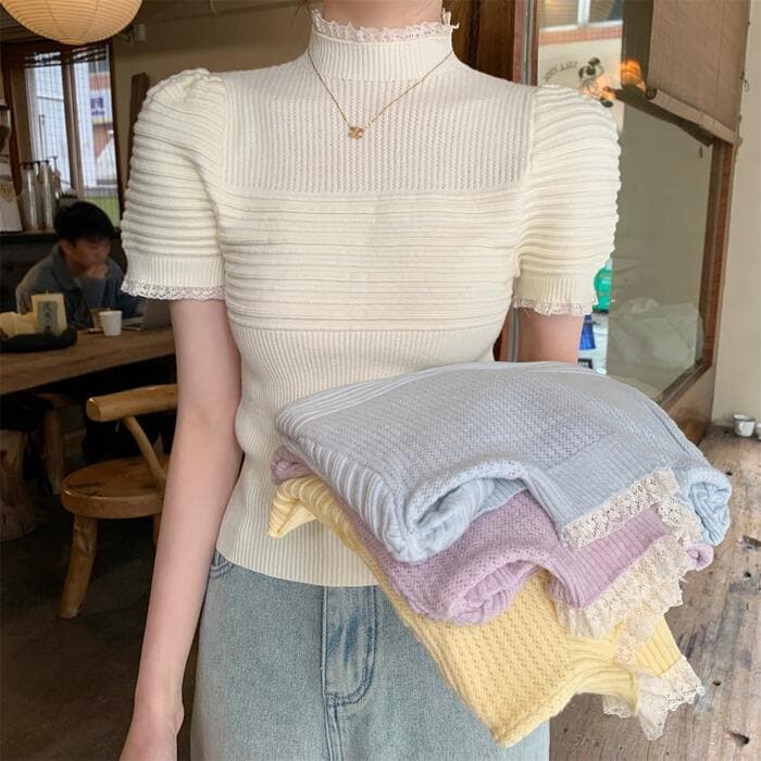 骨格ナチュラルハイネックフリルスリーブリブトップス
